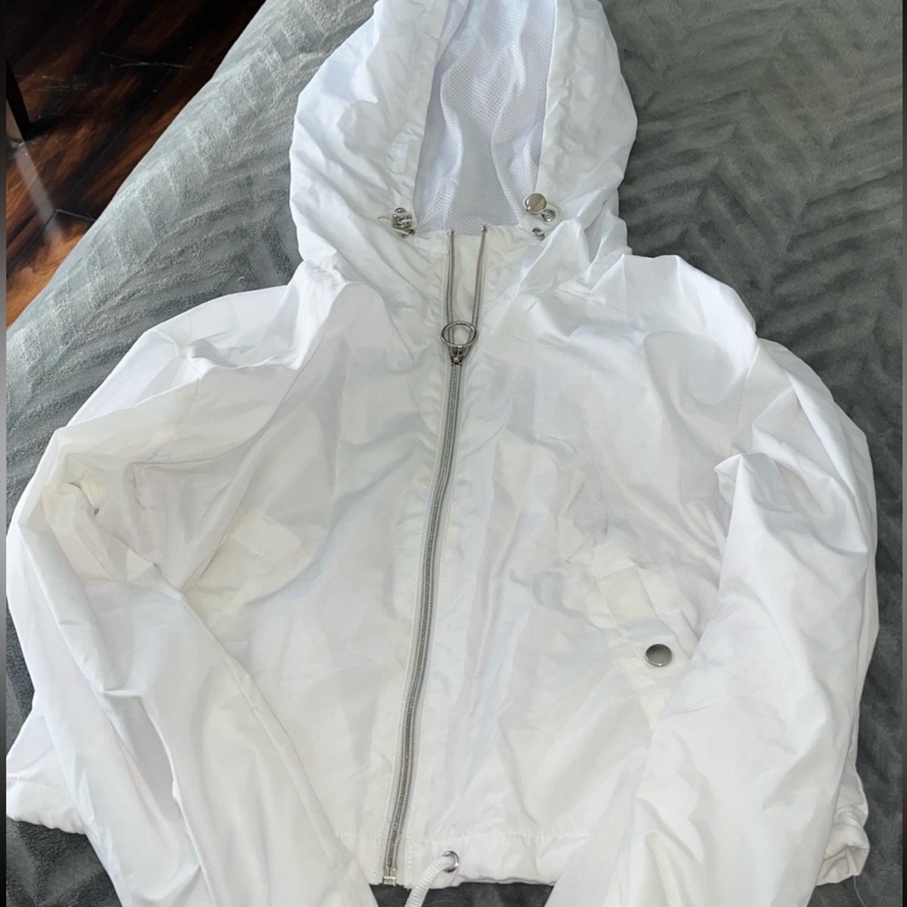 White windbreaker